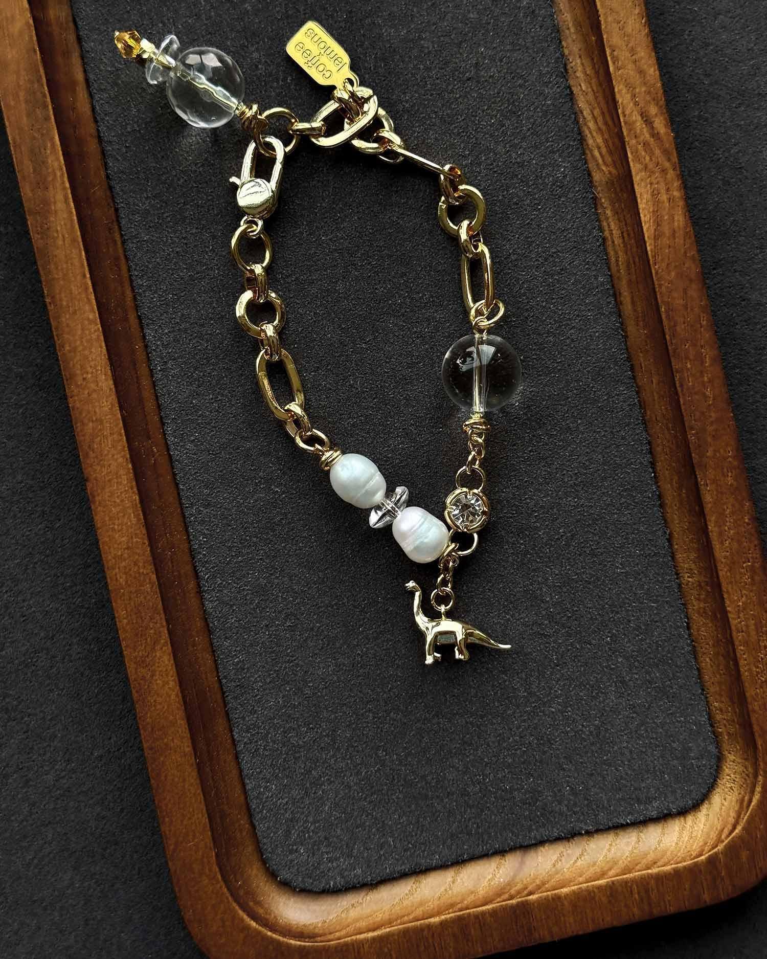 Браслет с золотым динозавром кофелемонс (shop_cxl_18.jpg) Браслет с золотым динозавром кофелемонс