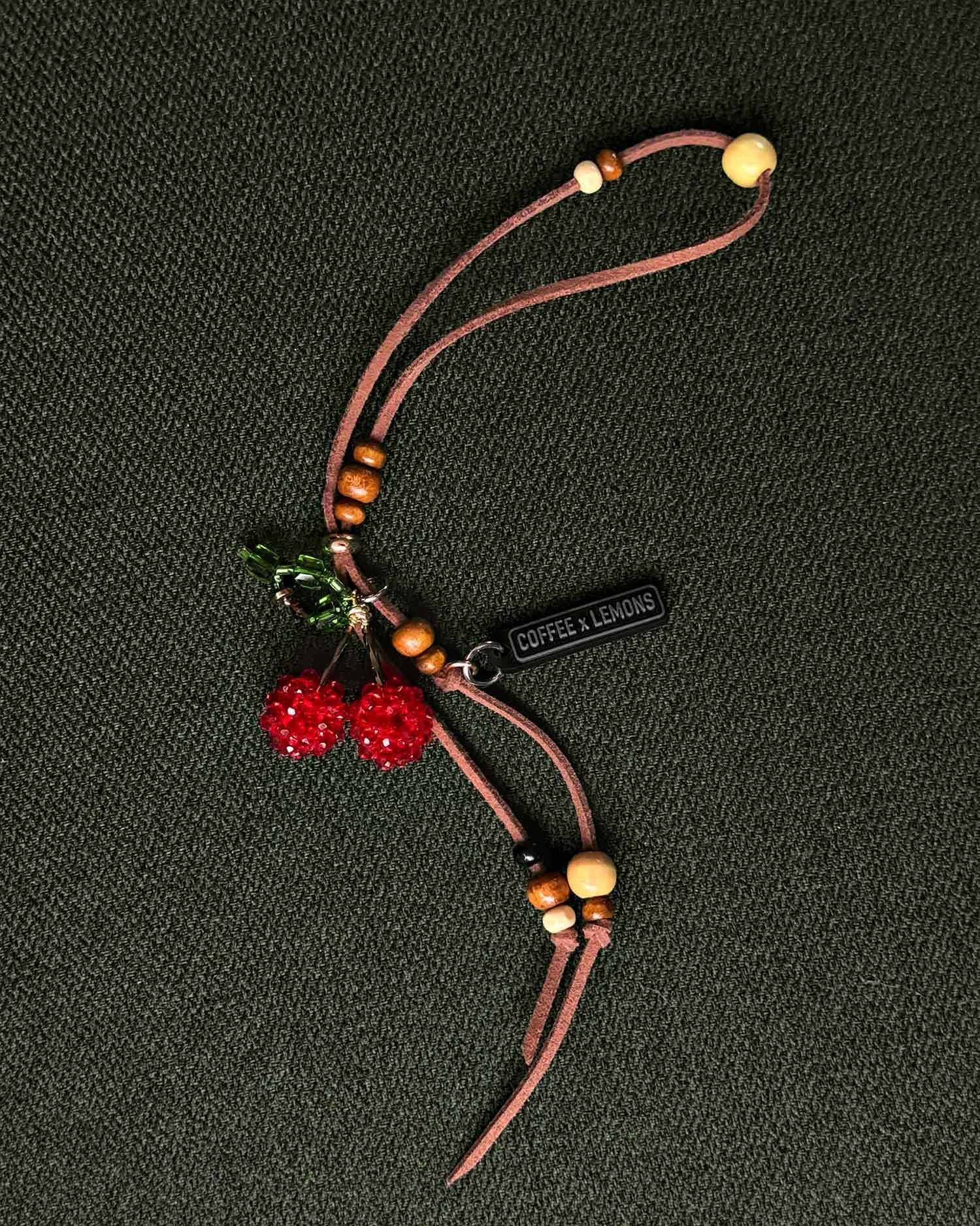 Брелок на сумку ручной работы в виде вишни от бренда COFFEE x LEMONS (shop_cxl_32.jpg) Брелок на сумку ручной работы в виде вишни от бренда COFFEE x LEMONS