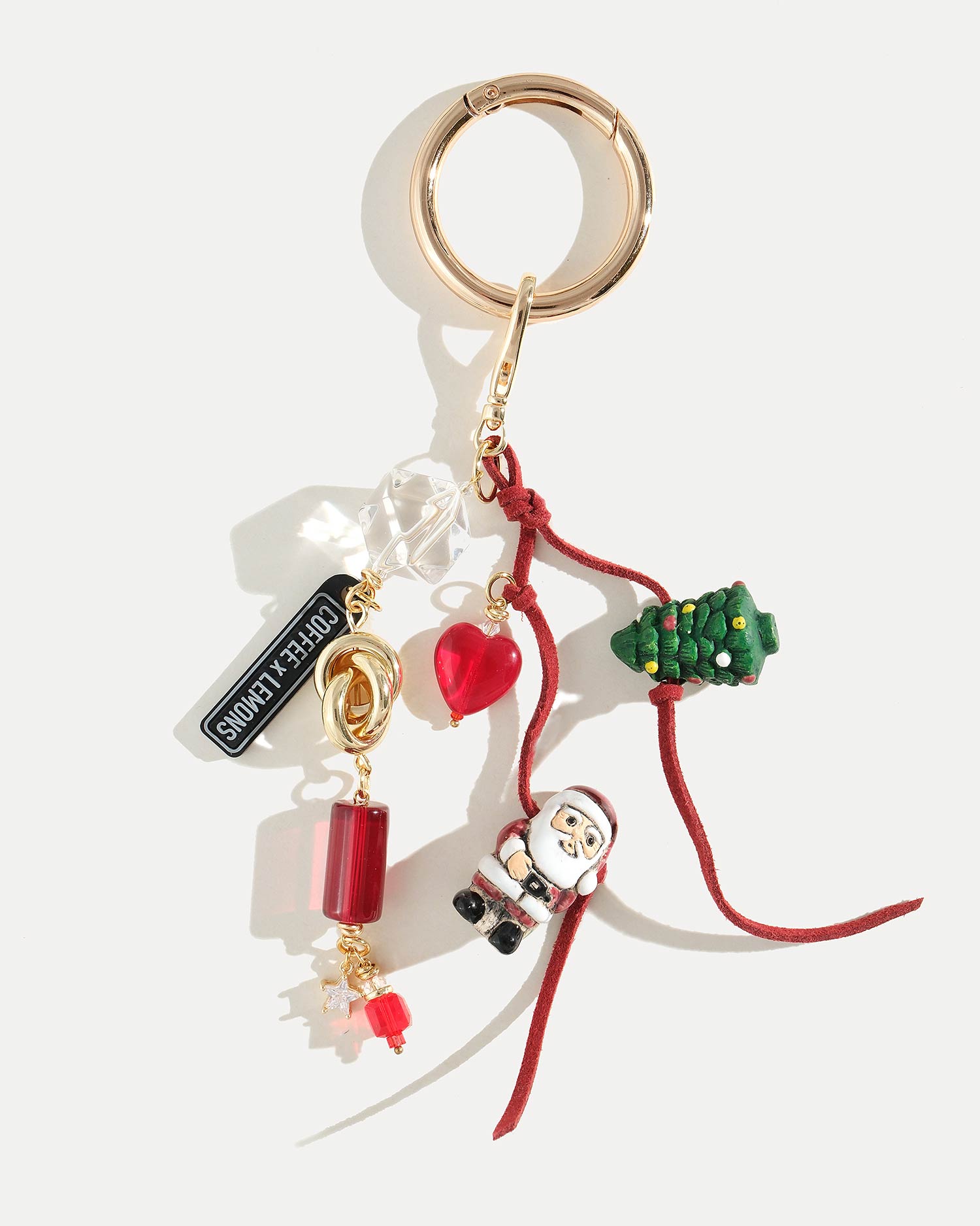Новогодний брелок для сумки с Санта Клаусом и елочкой на красном шнурке