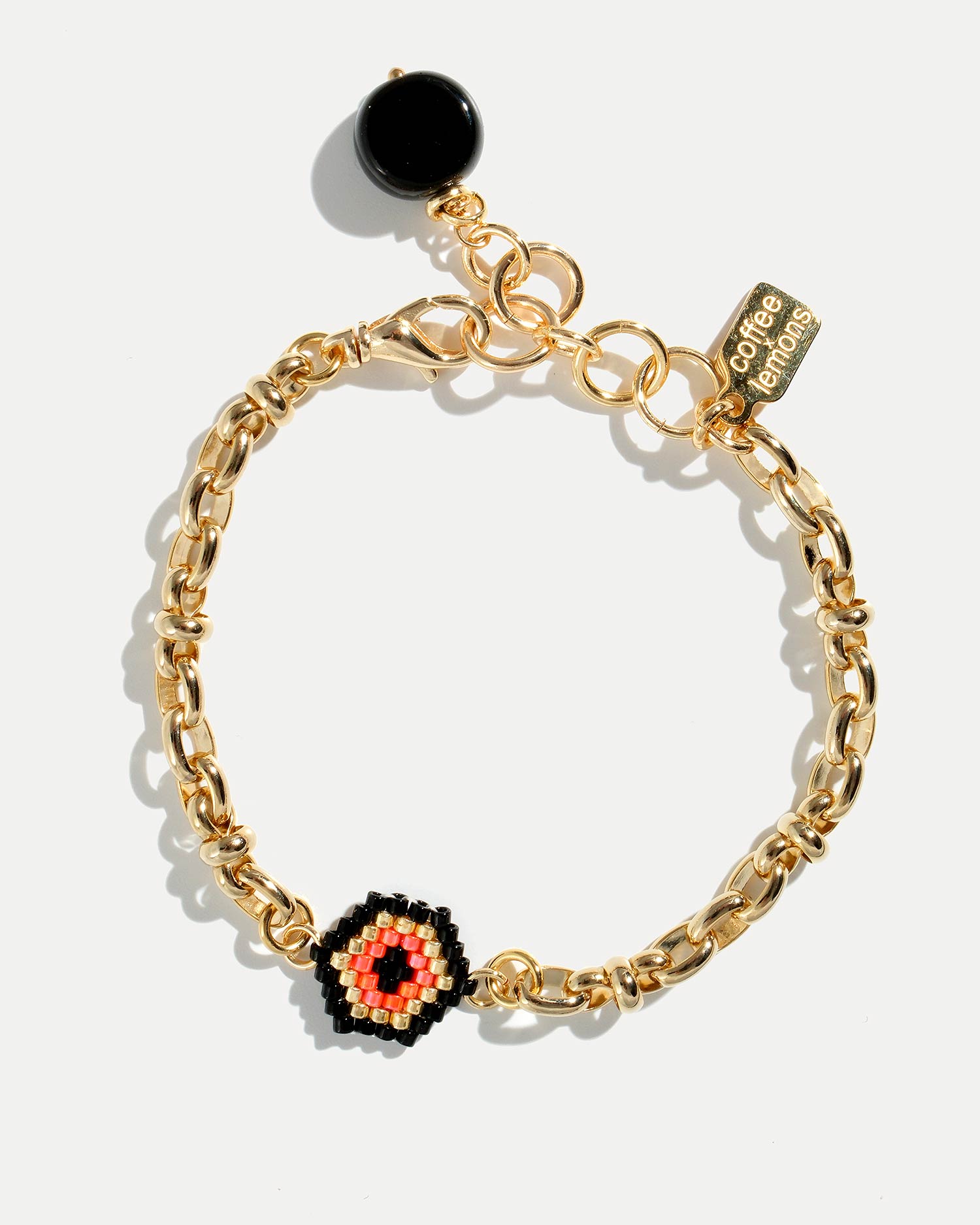 Золотой браслет с глазом из бисера