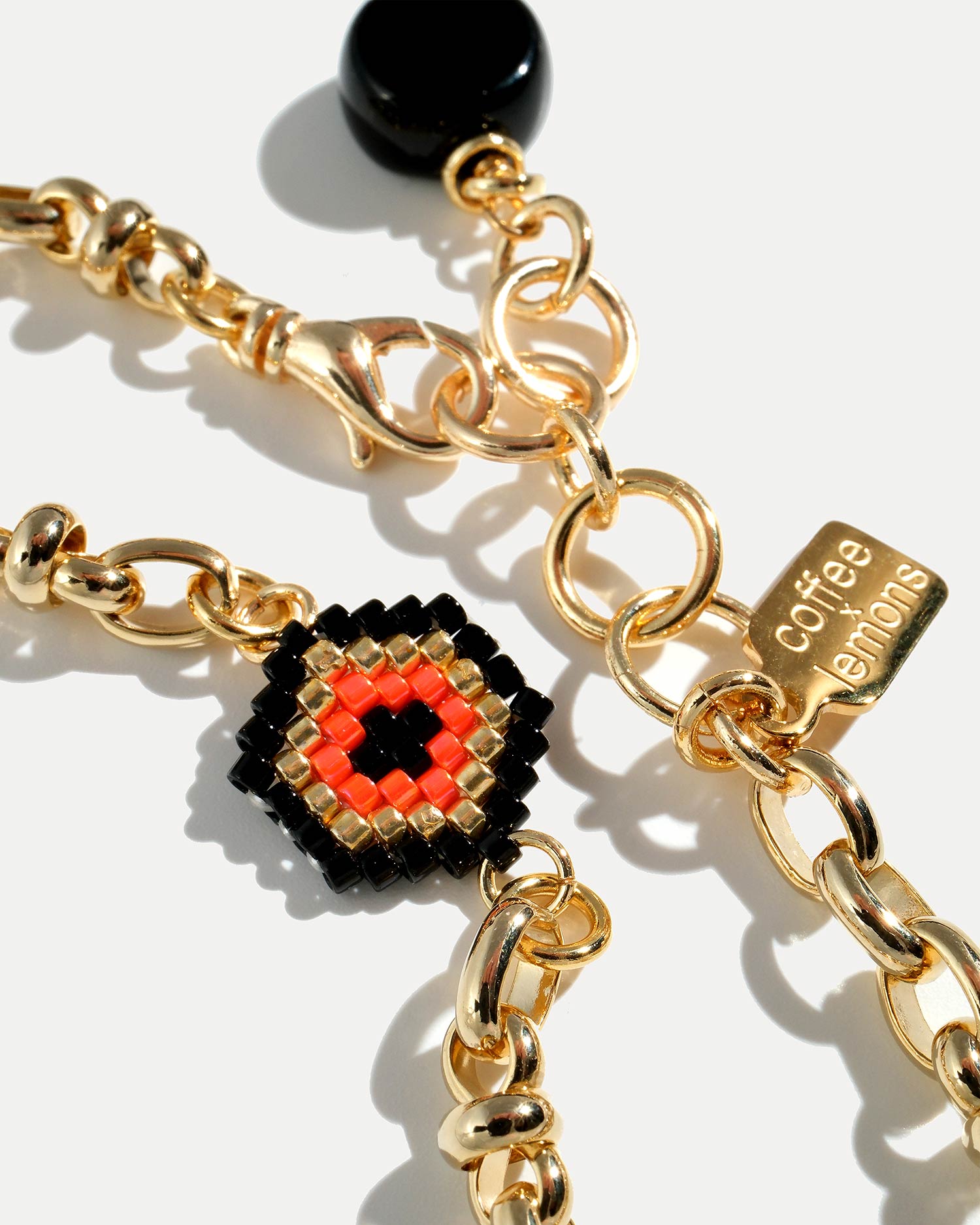 Браслет на золотой цепи с глазом из бисера COFFEE x LEMONS