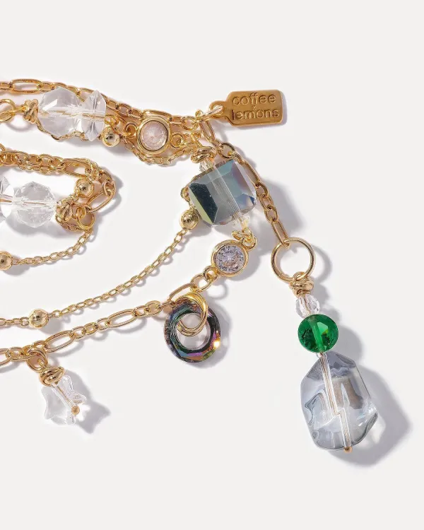 Золотое колье из кристаллов Swarovski c множеством подвесок