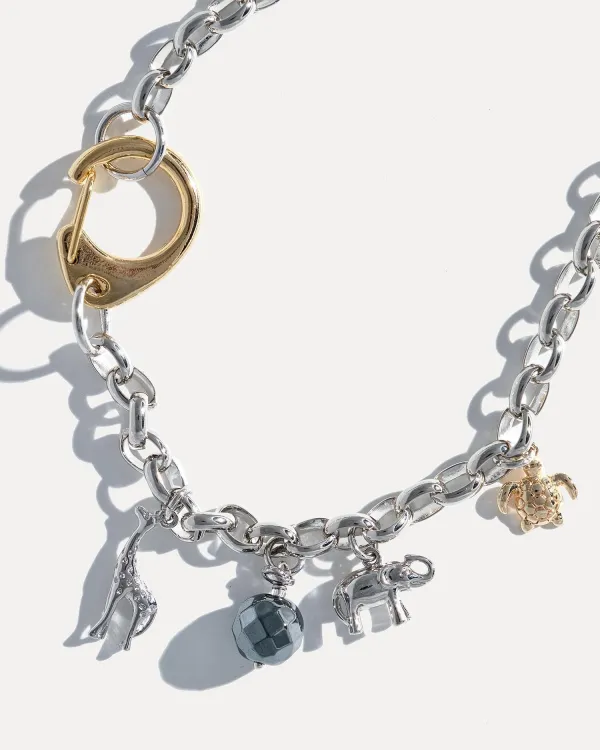 Серебряное колье с золотым карабином с фигурками африканских животных SAFARI 2.0 от COFFEE x LEMONS 