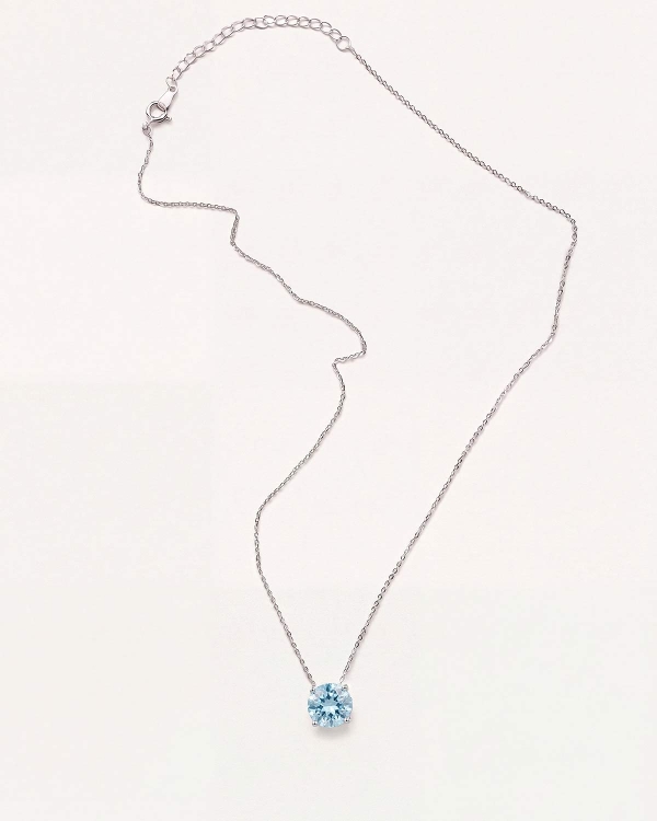 Колье на тонкой серебристой цепочке с большим круглым фианитом голубого цвета