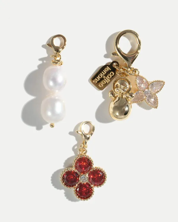 Набор подвесок от COFFEE x LEMONS с фианитами и золотой неваляшкой